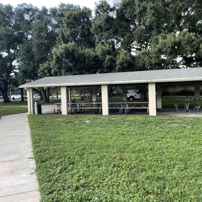 Shingle roof on park pavilion with picnic tables Shingle roof on park pavilion with picnic tables