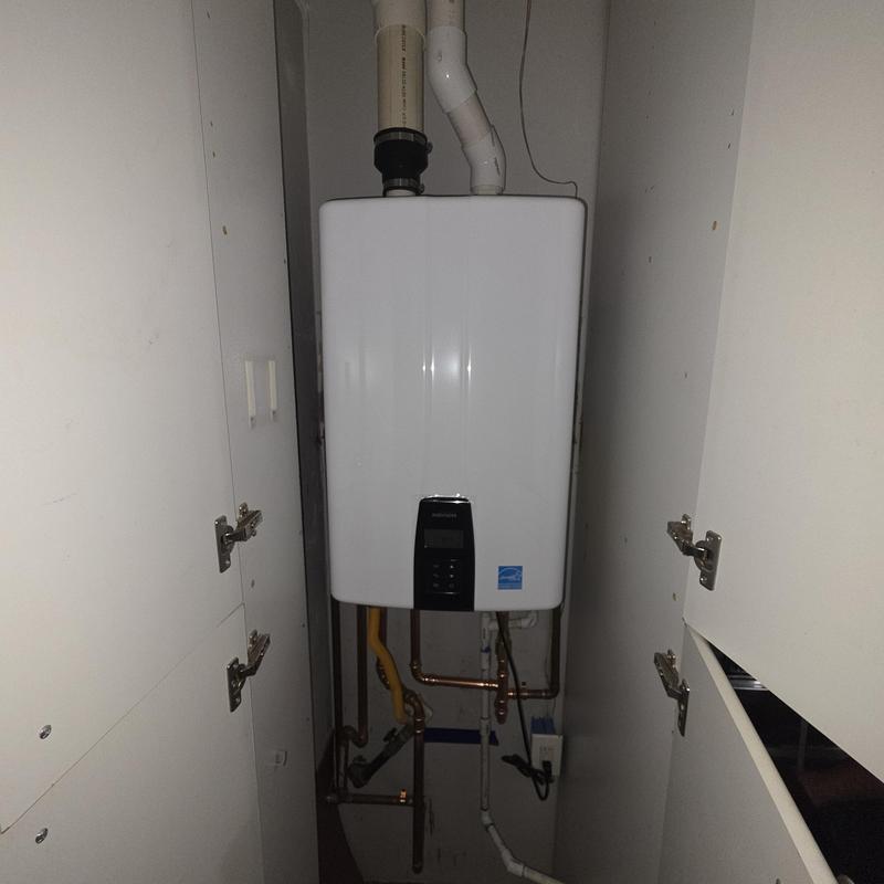 Tankless water heater installation with piping Tankless water heater installation with piping