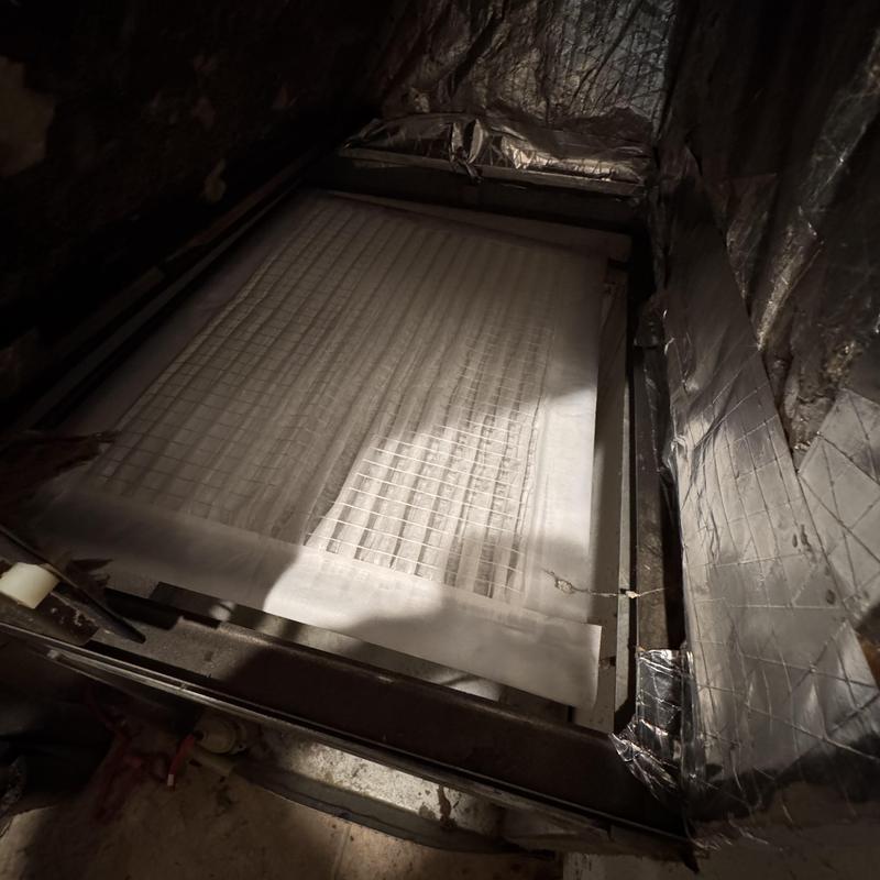 Heat pump air handler filter inside duct system