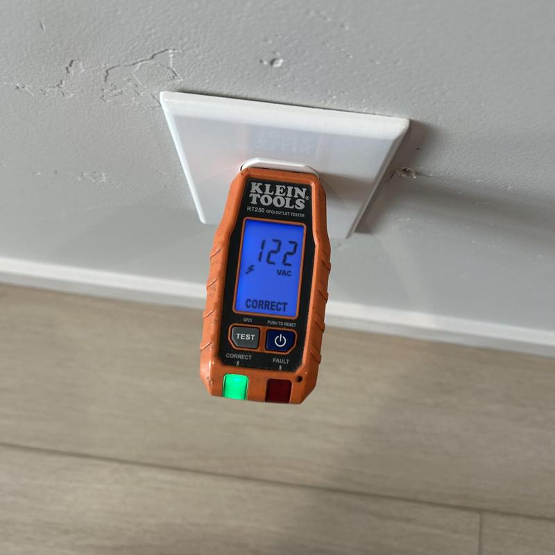 Electrical outlet with Klein Tools voltage tester