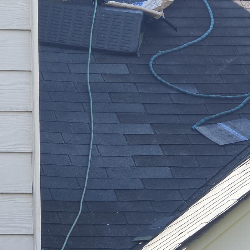 Asphalt shingles with pipe boots and step flashing repair