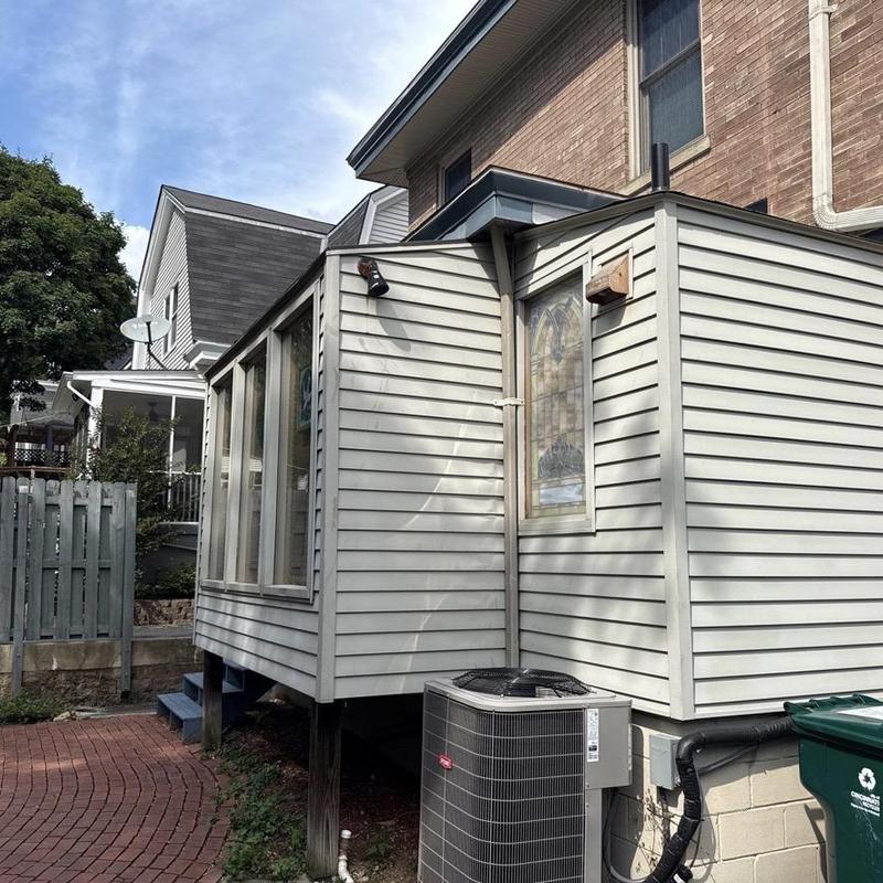 Vinyl siding inspection on home exterior Vinyl siding inspection on home exterior