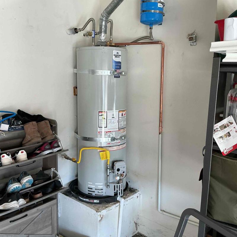 Water heater with expansion tank and copper piping
