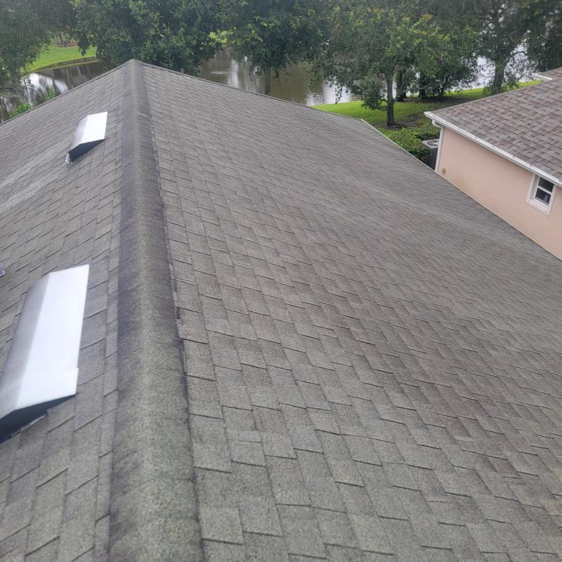 Asphalt shingle roof with ridge vents and skylights Asphalt shingle roof with ridge vents and skylights