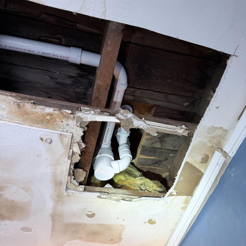 PVC tub drain pipes and ceiling access hole PVC tub drain pipes and ceiling access hole