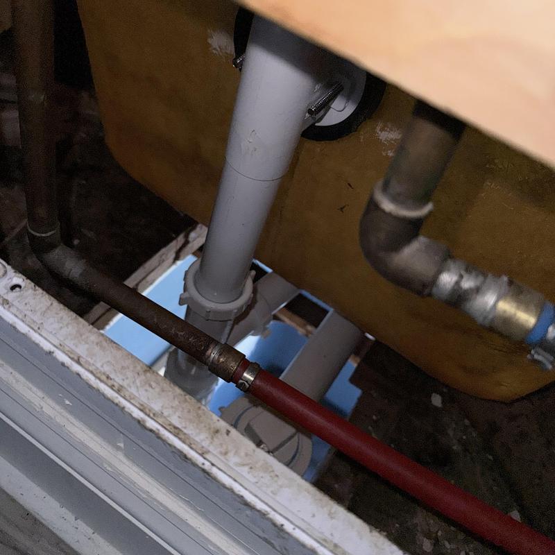 Tub drain PVC piping under bathroom sink Tub drain PVC piping under bathroom sink