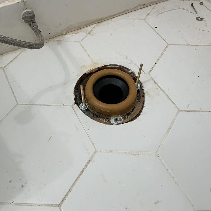 Toilet flange with new wax ring and closet bolts