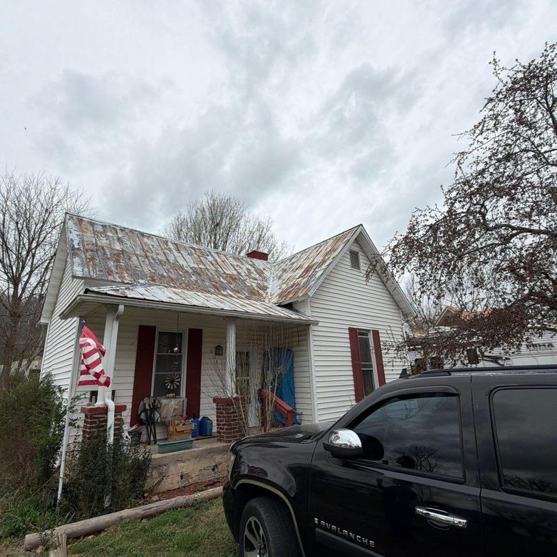 Metal roofing with extensive rust and deterioration