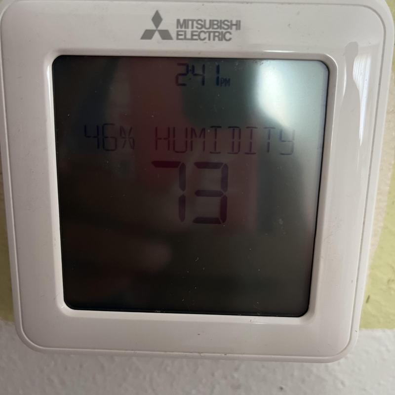 Mitsubishi Electric thermostat displaying humidity and temperature Mitsubishi Electric thermostat displaying humidity and temperature