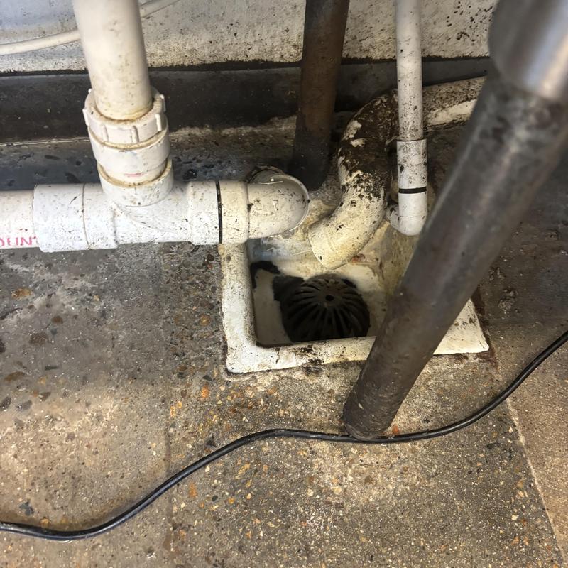 Dish pit drain and PVC piping with clog removal Dish pit drain and PVC piping with clog removal