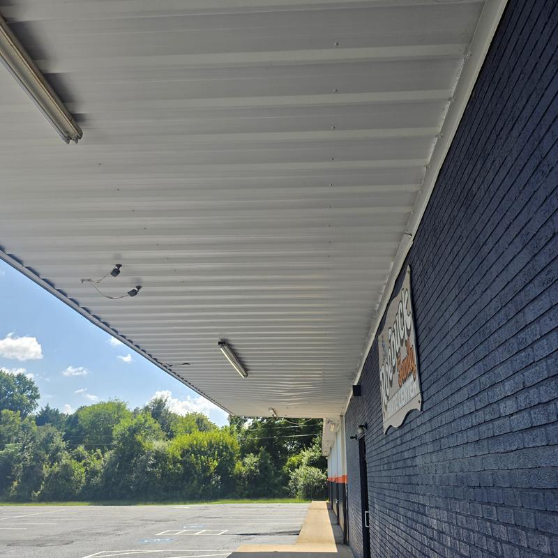 Metal roof canopy and building exterior in Moore SC