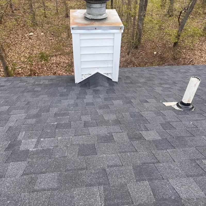 CertainTeed Landmark Pro shingles on roof with chimney CertainTeed Landmark Pro shingles on roof with chimney