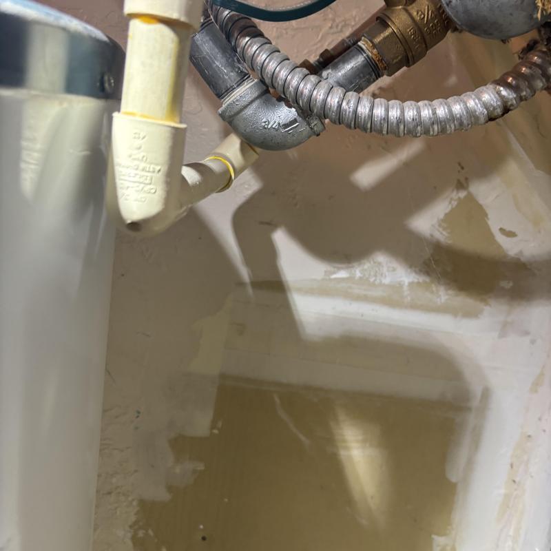 Galvanized waterline piping under kitchen sink with fittings Galvanized waterline piping under kitchen sink with fittings