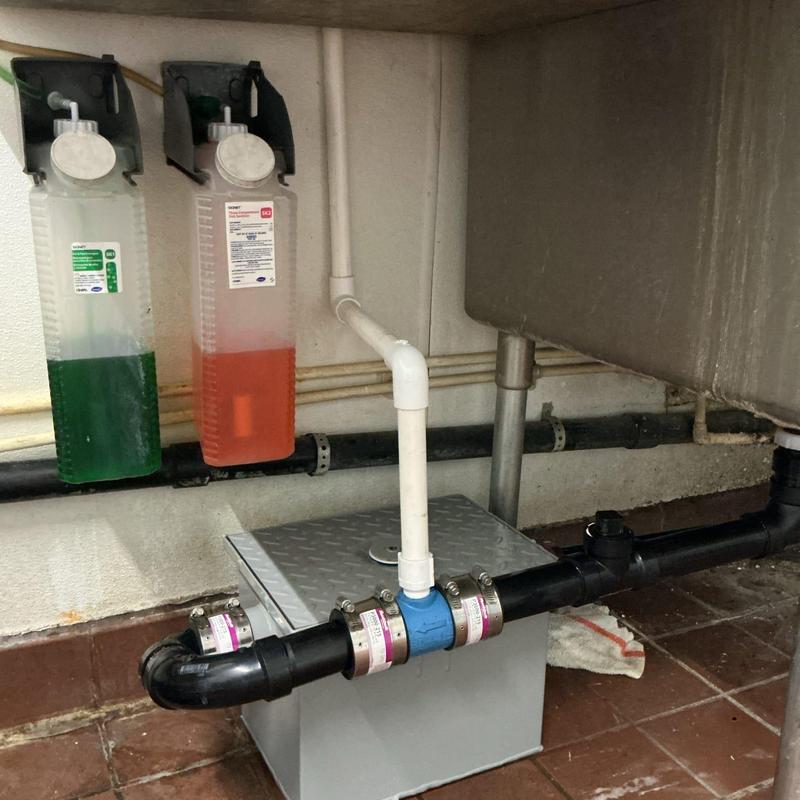 Under-sink grease trap with ABS piping installation