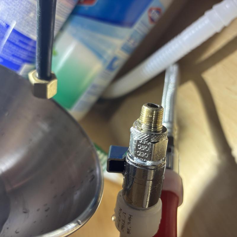 RO system fitting with thread sealant applied under sink RO system fitting with thread sealant applied under sink