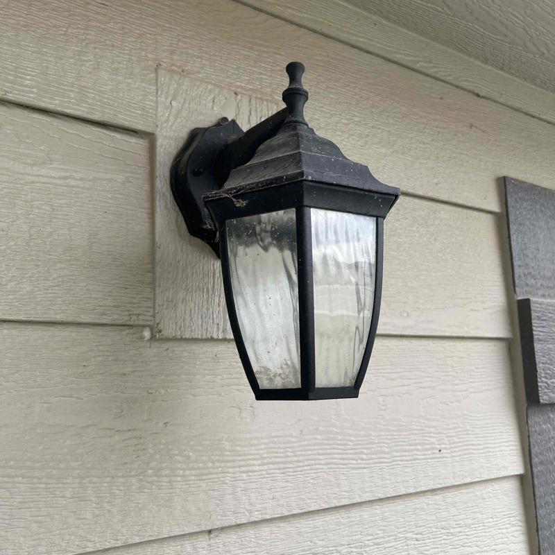 LED integrated front porch light fixture on home exterior LED integrated front porch light fixture on home exterior