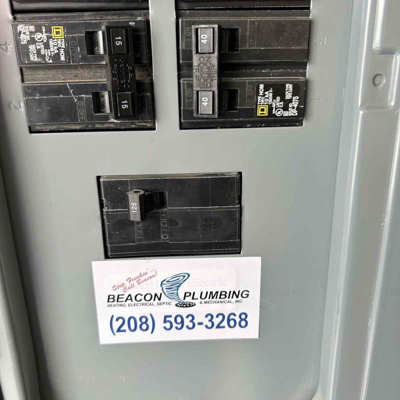 Electrical breaker panel with circuit breakers and label Electrical breaker panel with circuit breakers and label