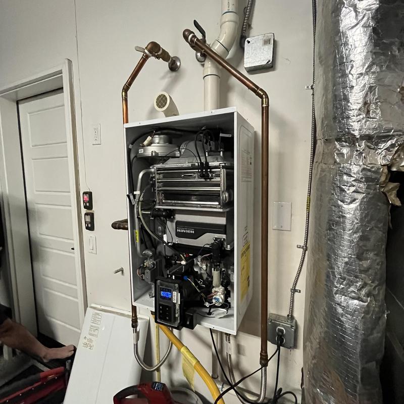 Tankless water heater with internal pump diagnostic check Tankless water heater with internal pump diagnostic check