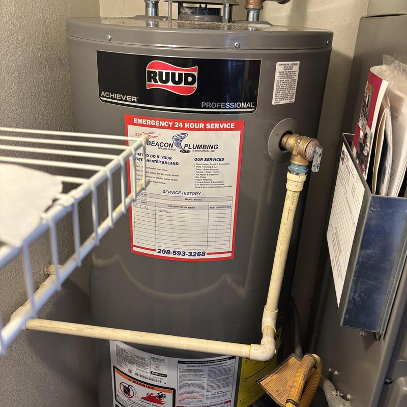 RUUD water heater installation with plumbing connections RUUD water heater installation with plumbing connections
