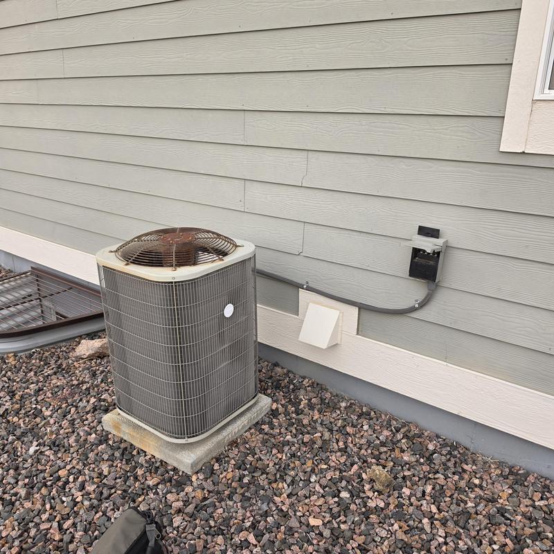 Payne air conditioner outdoor unit on gravel bed Payne air conditioner outdoor unit on gravel bed