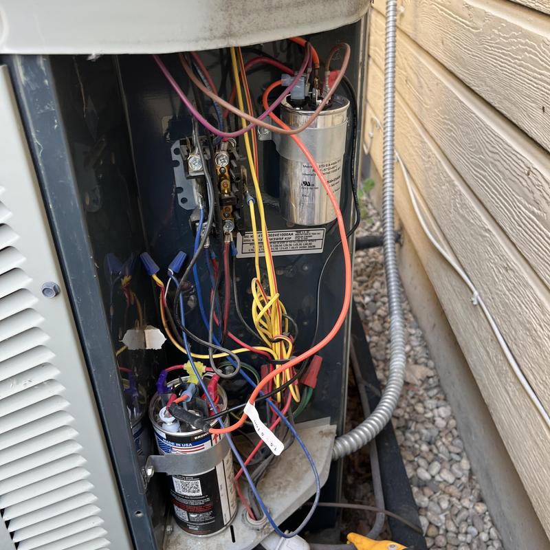 HVAC capacitor and wiring inside outdoor unit HVAC capacitor and wiring inside outdoor unit