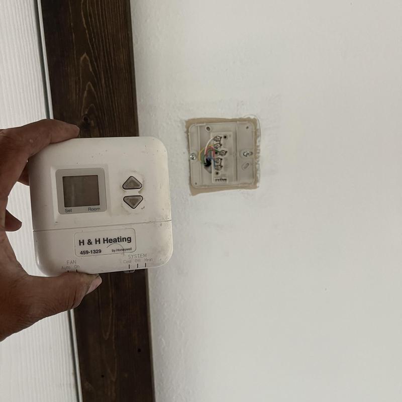 Thermostat replacement with exposed wiring box Thermostat replacement with exposed wiring box
