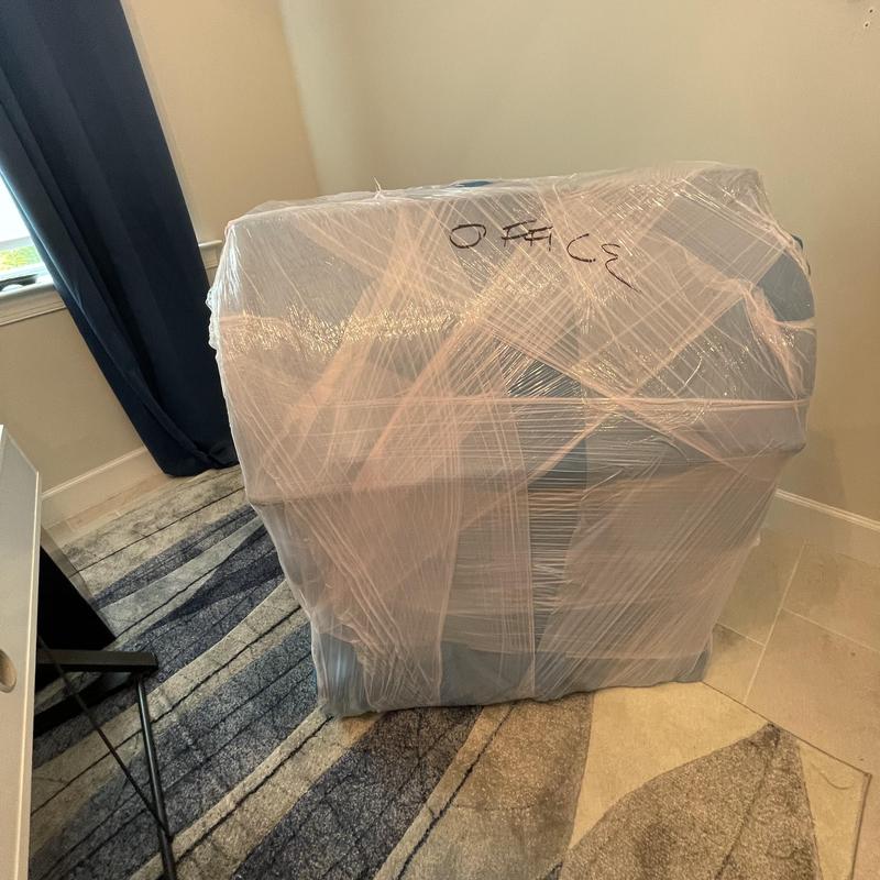 Office chair wrapped for moving and floor protection Office chair wrapped for moving and floor protection