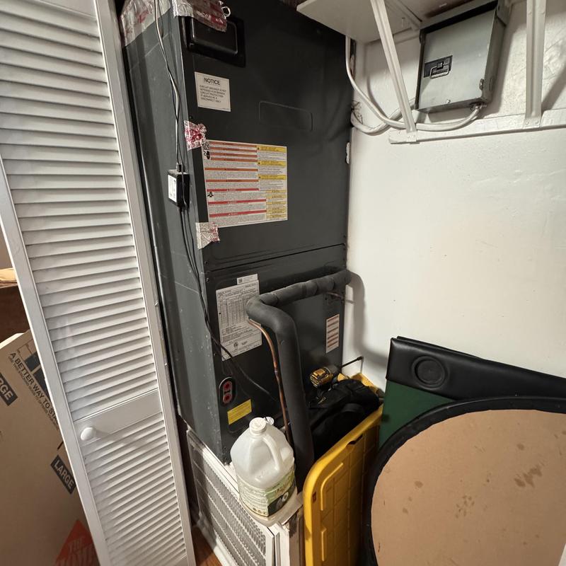 Heat pump split system with insulation foam tubing inside closet