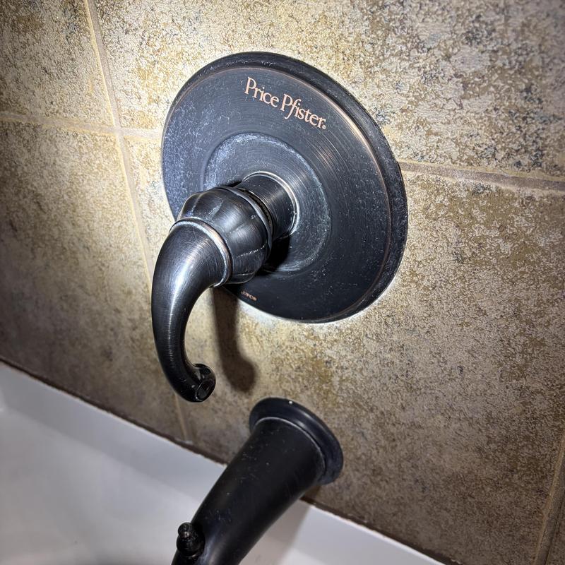 Tub shower diverter valve with handle on tile wall Tub shower diverter valve with handle on tile wall