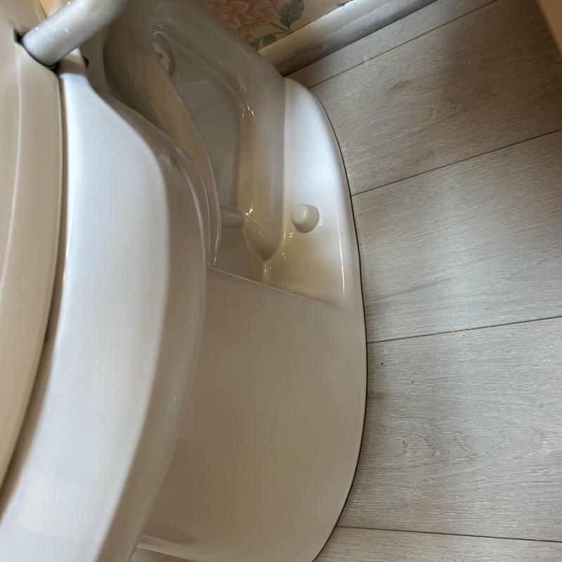 Floor mount toilet installation in residential bathroom Floor mount toilet installation in residential bathroom