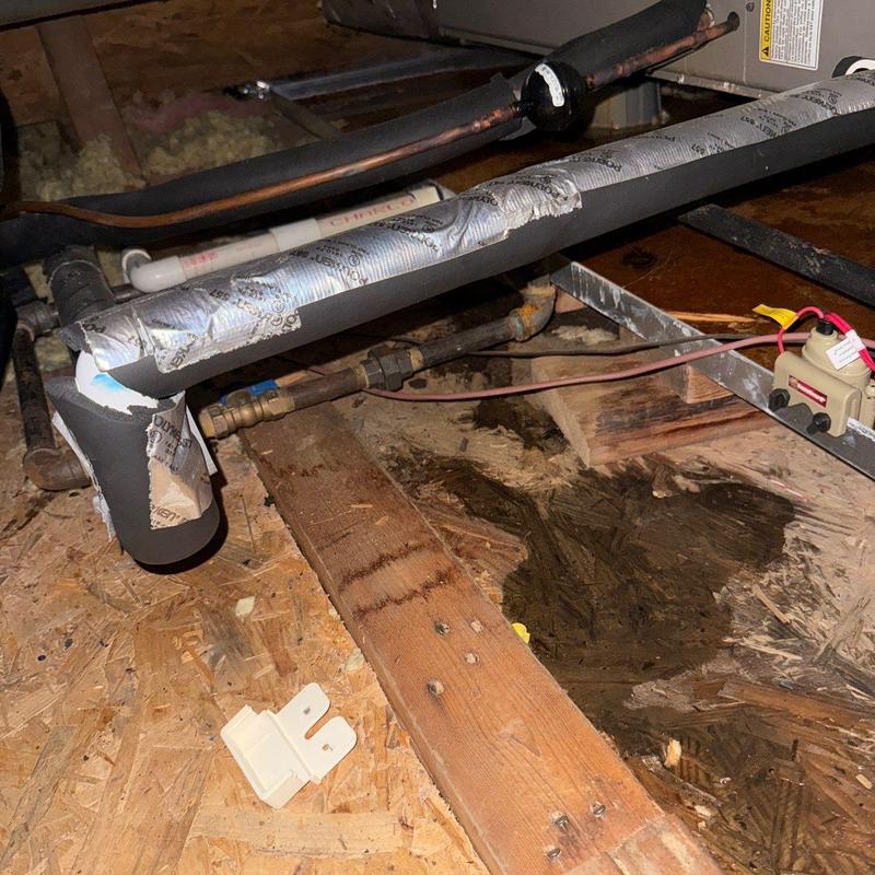 HVAC condensate drain pipe with insulation damage