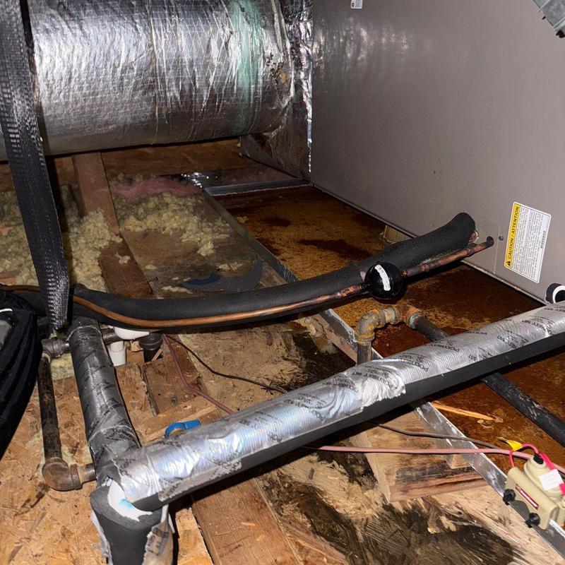 HVAC copper tubing and insulation in attic space