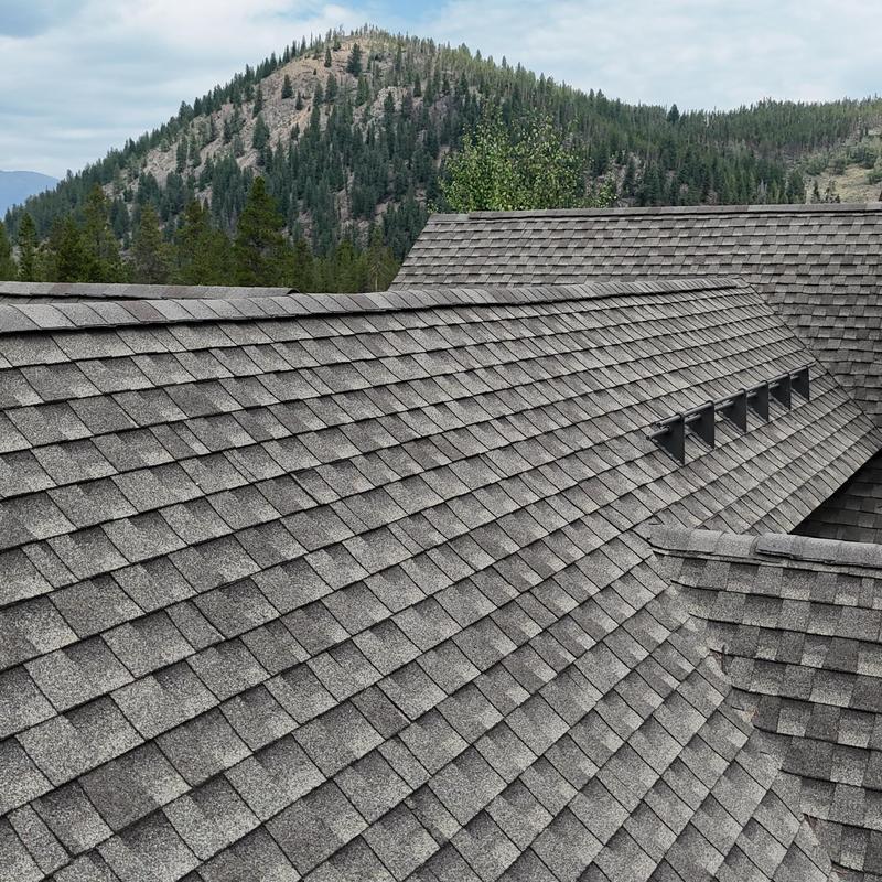 Asphalt shingle roof with heat tape vents in mountains