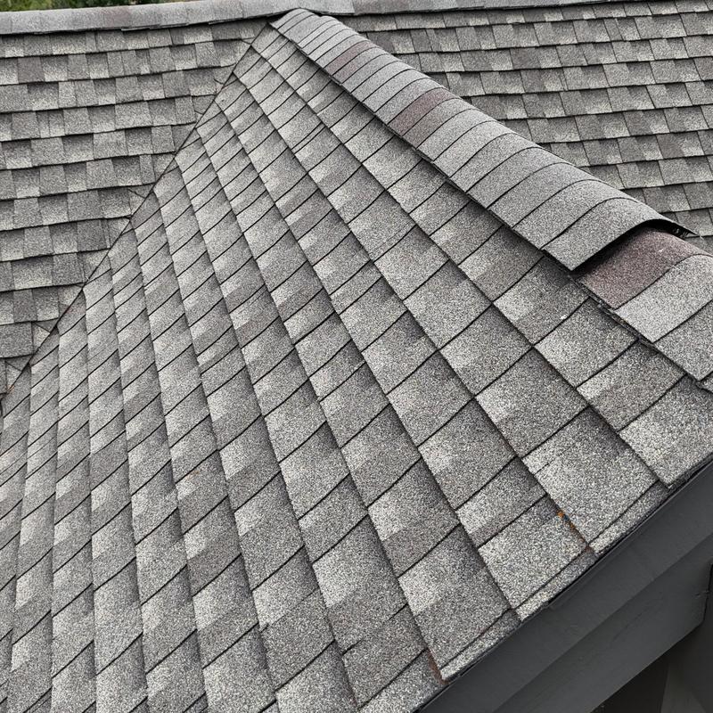 Asphalt shingle roof ridge and hip inspection detail
