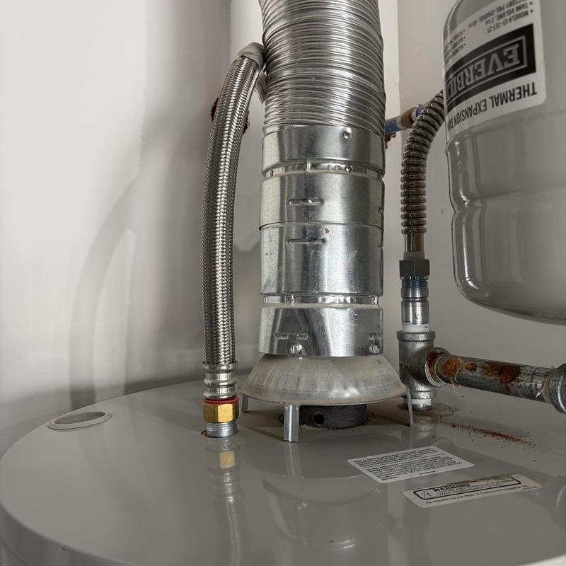 Water heater vent pipe and flexible connectors installation Water heater vent pipe and flexible connectors installation