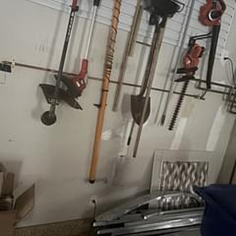 Gas line installation under tankless water heater in garage