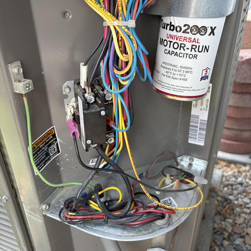 Motor-run capacitor and electrical wiring inside AC unit