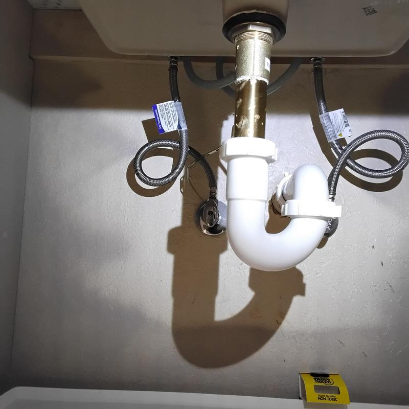 Push pop sink drain assembly under basin installation