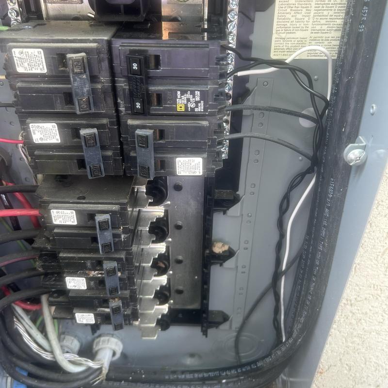 Electrical breaker panel with circuit breakers and wiring