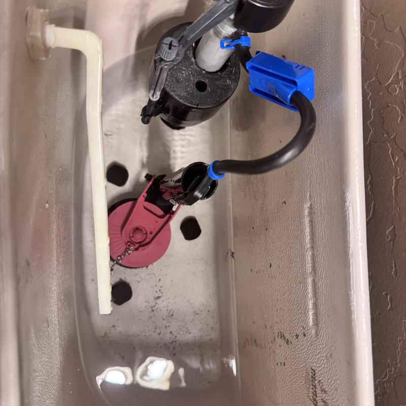 Toilet fill valve and flapper inside tank Toilet fill valve and flapper inside tank