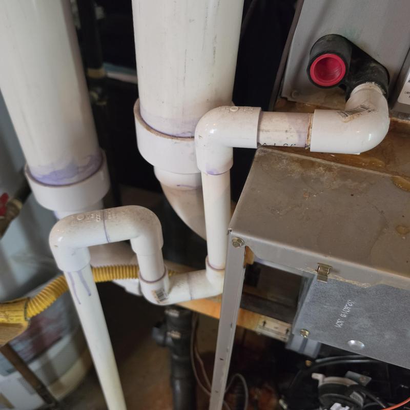 Air conditioner PVC drain pipes with clean out ports Air conditioner PVC drain pipes with clean out ports
