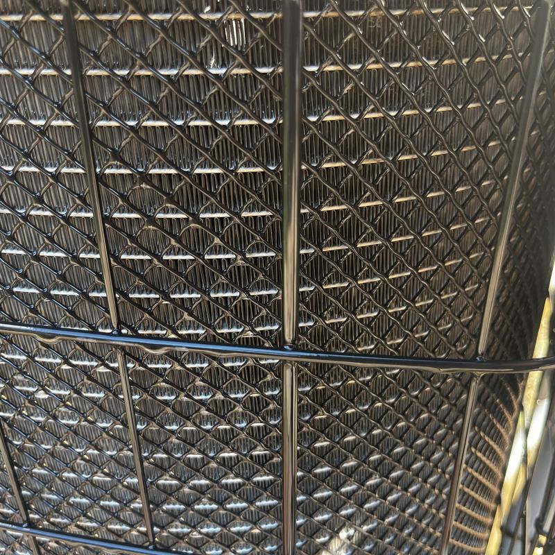 Outdoor air conditioner condenser coil and protective grill Outdoor air conditioner condenser coil and protective grill