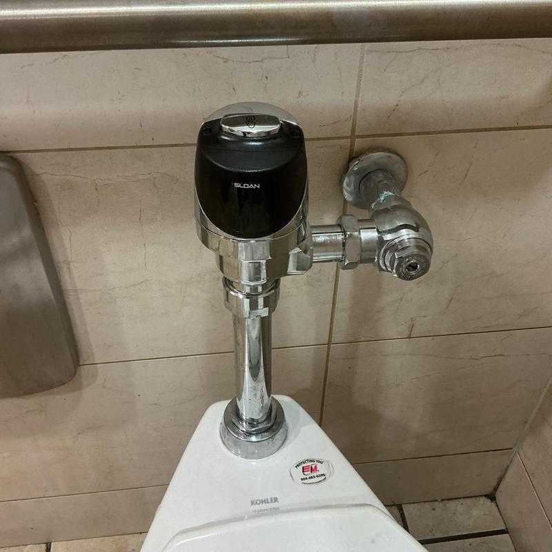 Flush valve and urinal installation in restroom, Jacksonville FL Flush valve and urinal installation in restroom, Jacksonville FL