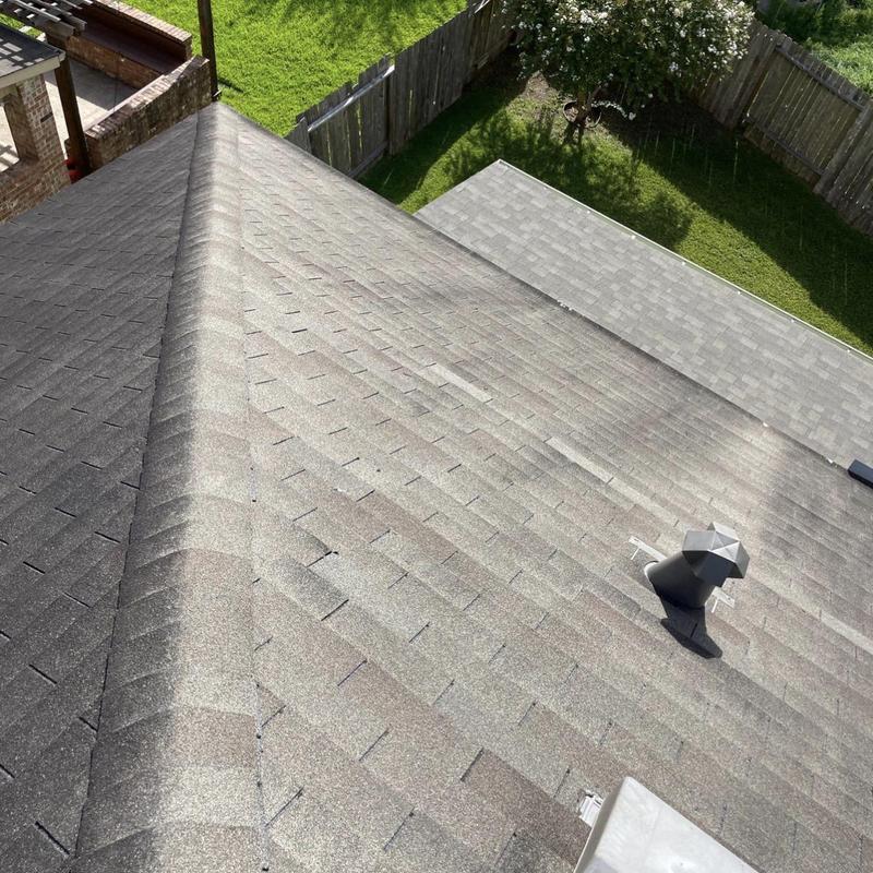 Roof shingles and vent flashing on residential roof