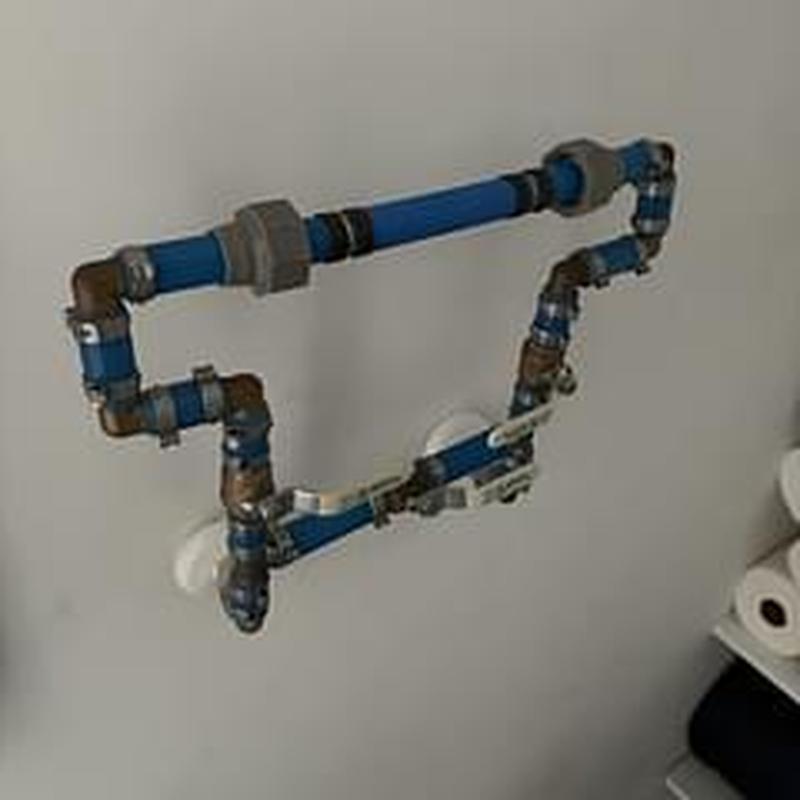 Water line loop installation with piping and fittings Water line loop installation with piping and fittings