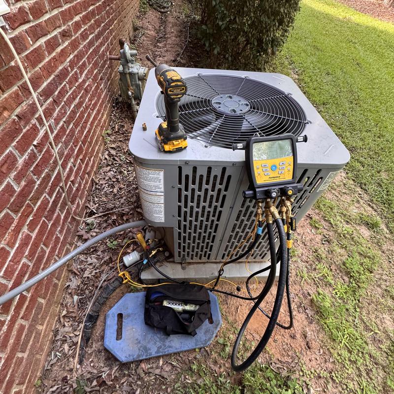 Heat pump unit with diagnostic gauges and drill