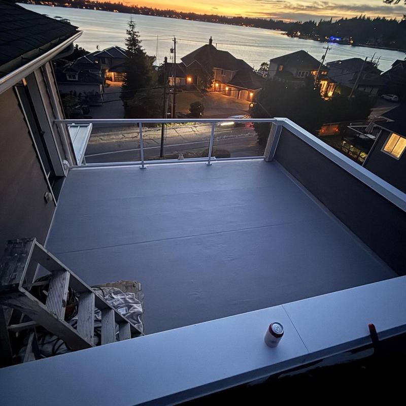 Flat roof waterproofing membrane at sunset view