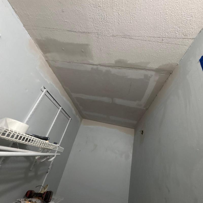 Ceiling drywall patching and repair in storage room