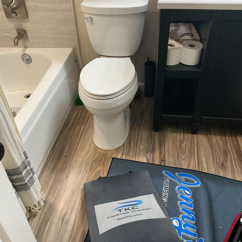 Toilet with new wax ring installation mat Toilet with new wax ring installation mat