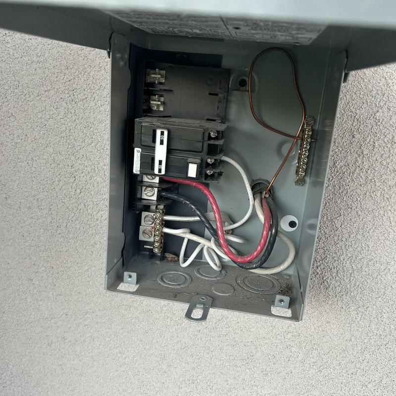 Electrical breaker panel with rewired outlet connections Electrical breaker panel with rewired outlet connections